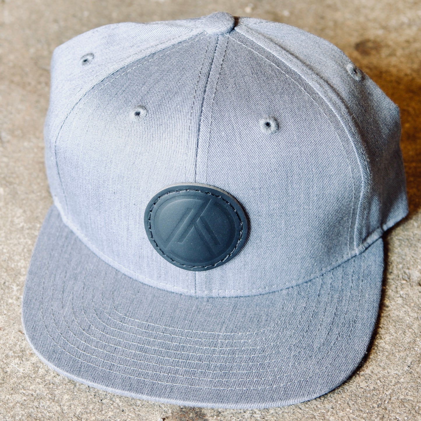 Gray Snapback with Black Leather Logo Patch